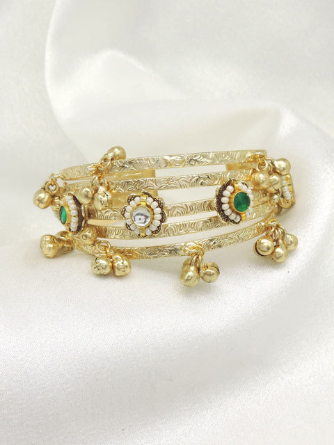 Green stone ghungroo cuff bangle by Joyrias