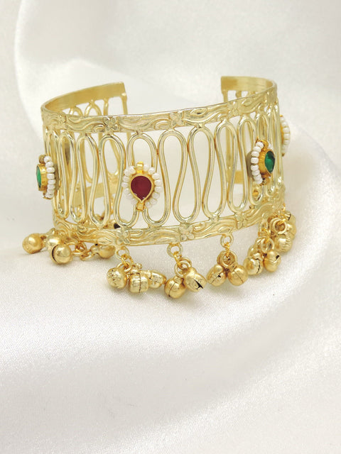 Gold tone ghungroo cuff bracelet by Joyrias