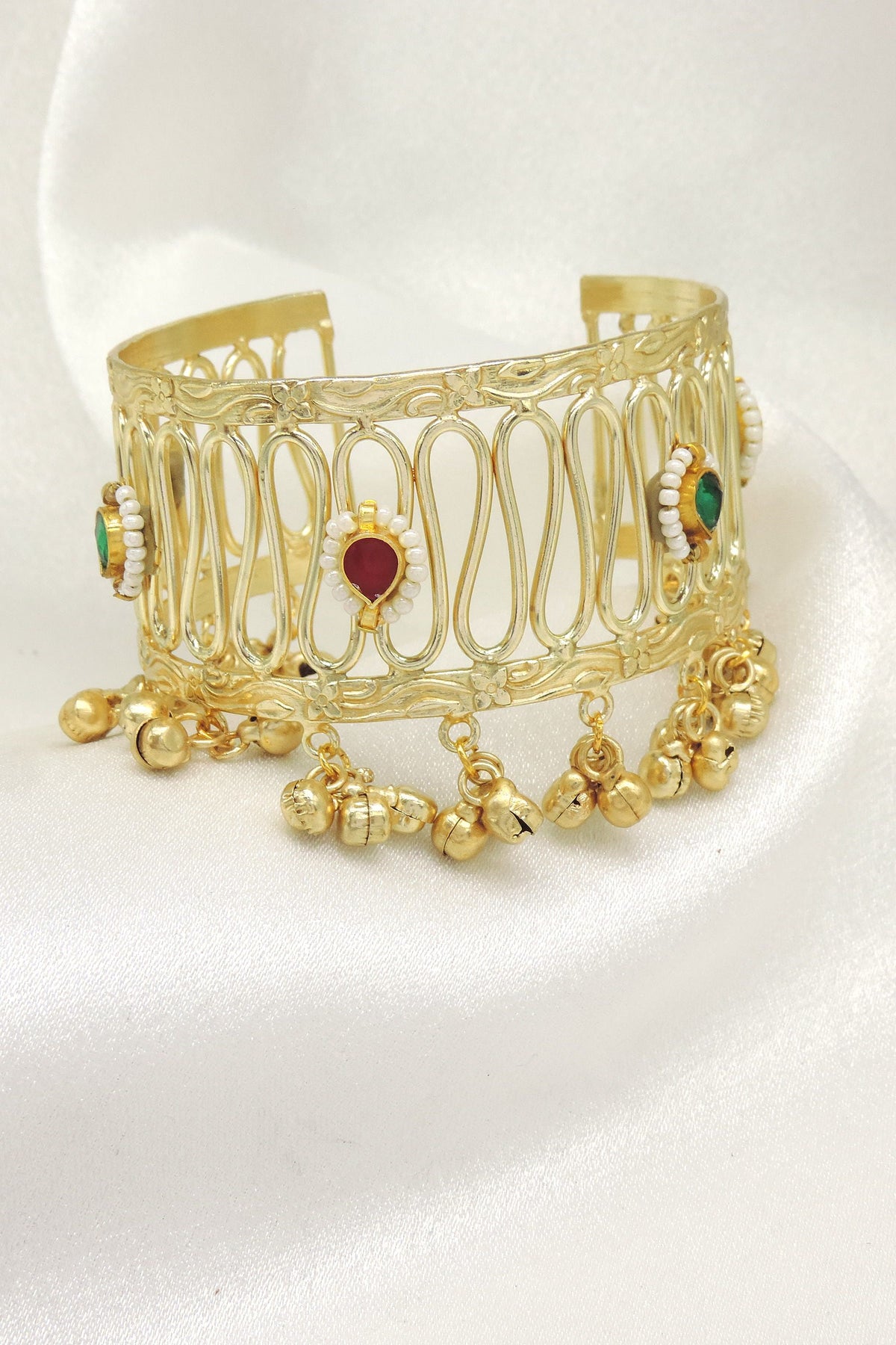 Gold tone ghungroo cuff bracelet by Joyrias