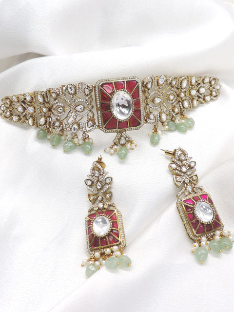 Regal ruby emerald kundan choker necklace set with matching earrings by joyrias
