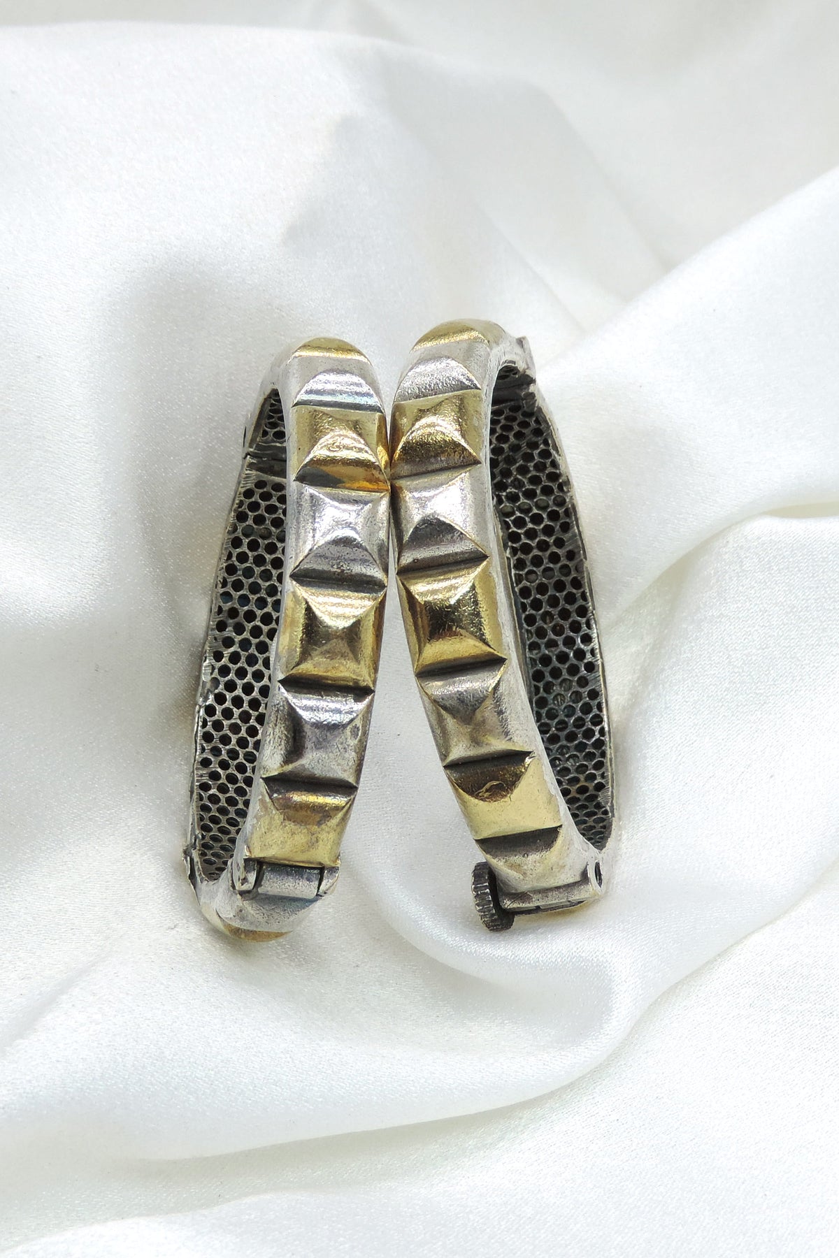 Oxidized dual-tone gold silver textured bangle set with geometric detailing by joyrias