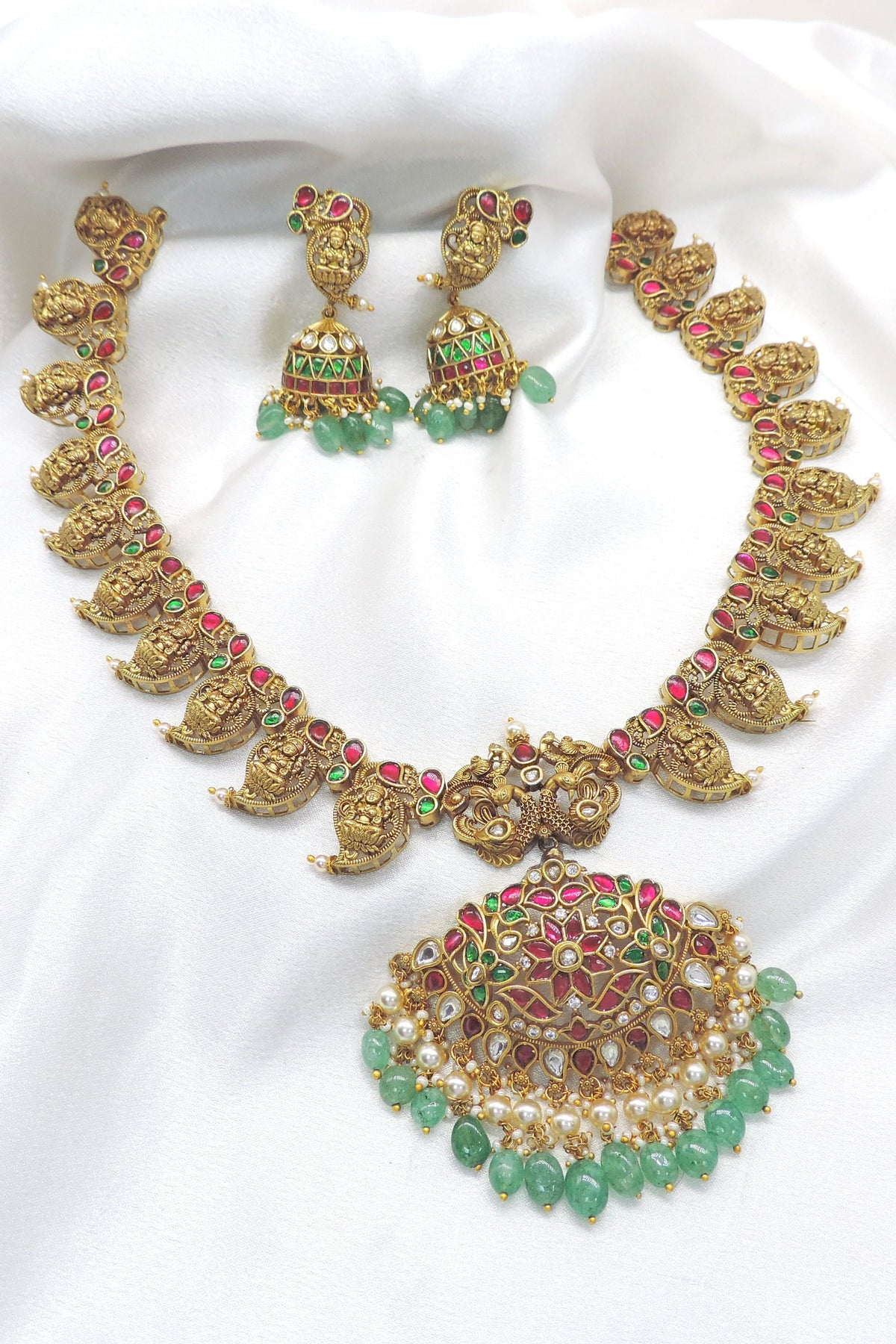 Royal gold pearl traditional necklace set with ruby emerald accents and jhumka earrings by joyrias