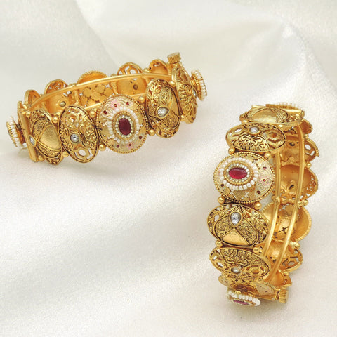 Royal kundan bangle set by Joyrias