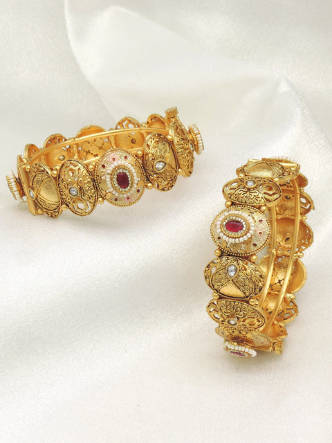 Royal kundan bangle set by Joyrias