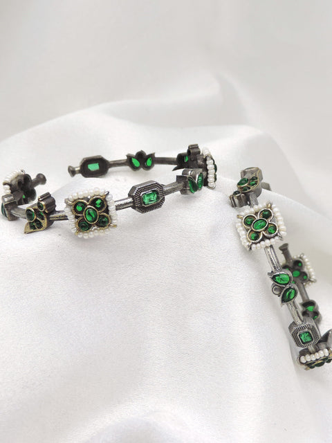 Oxidized silver green stone floral openable bangle set with pearl detailing by joyrias