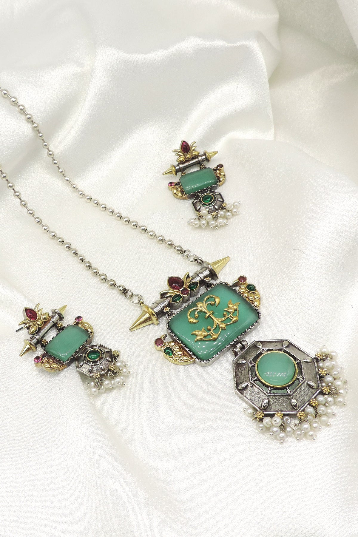 Mint dual tone pendant set by Joyrias