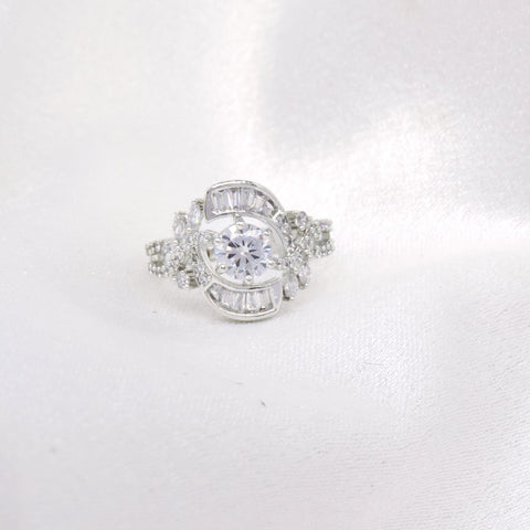 Silver-toned AD CZ ring with intricate detailing by joyrias