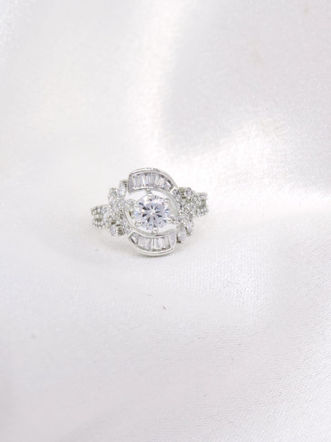 Silver-toned AD CZ ring with intricate detailing by joyrias