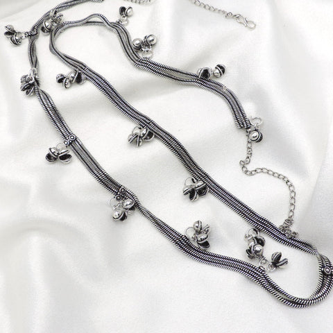 Oxidized silver minimal ghungroo Kamarbandh waist chain with double-chain detailing and delicate dangling bell charms by joyrias