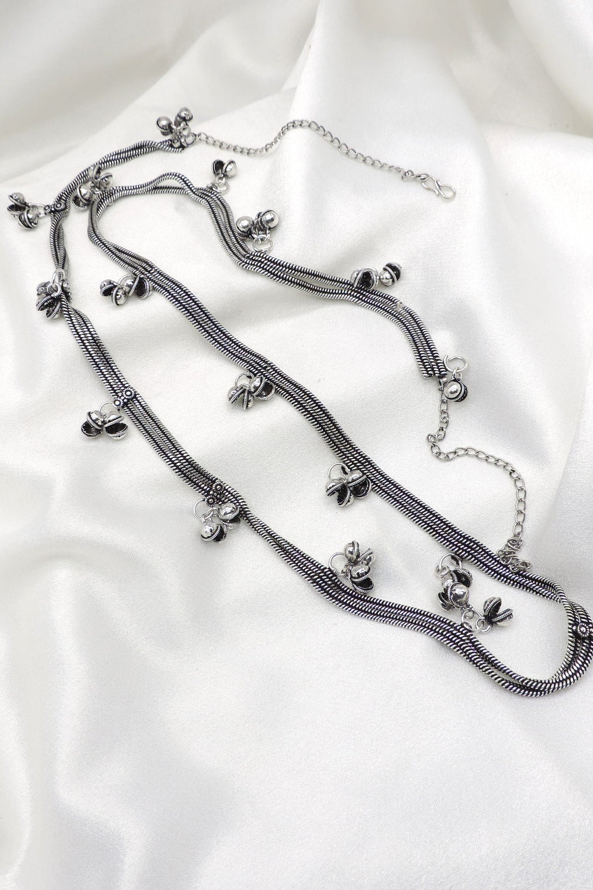 Oxidized silver minimal ghungroo Kamarbandh waist chain with double-chain detailing and delicate dangling bell charms by joyrias