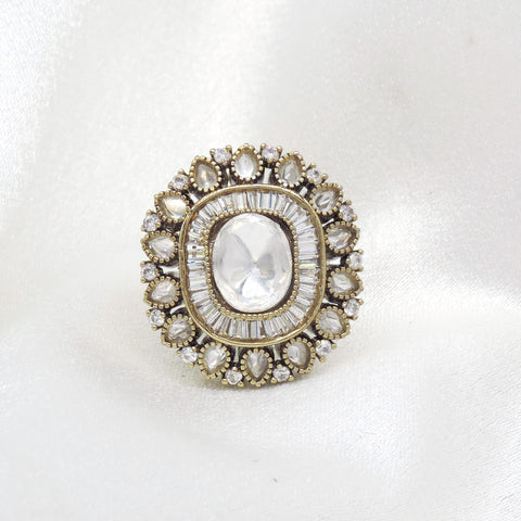 Timeless kundan oval ring with layered stone detailing by joyrias