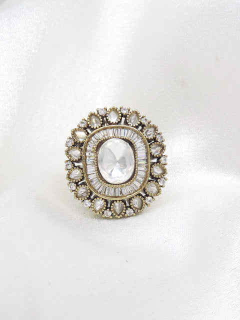Timeless kundan oval ring with layered stone detailing by joyrias