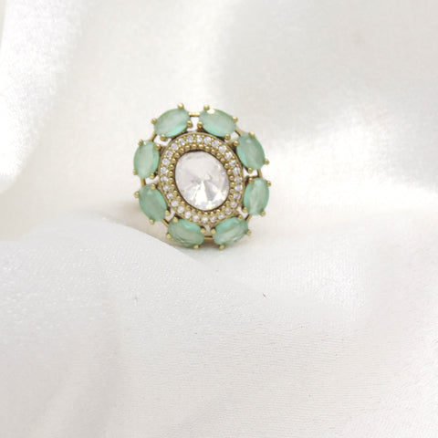 Mint green kundan ring with gold-toned detailing by joyrias