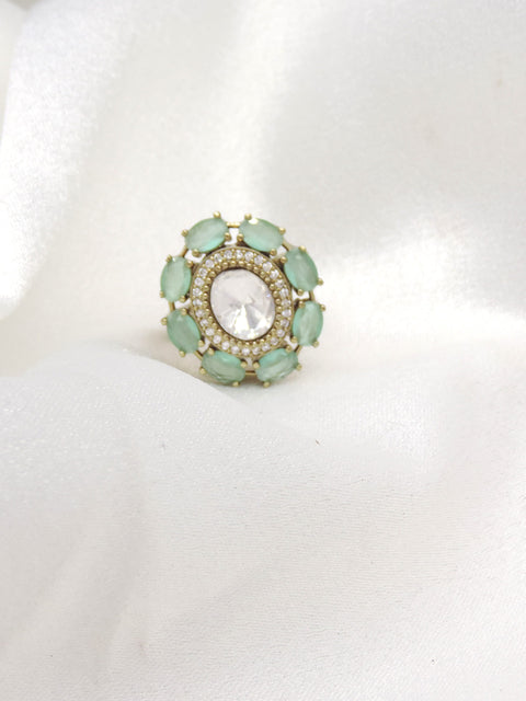 Mint green kundan ring with gold-toned detailing by joyrias