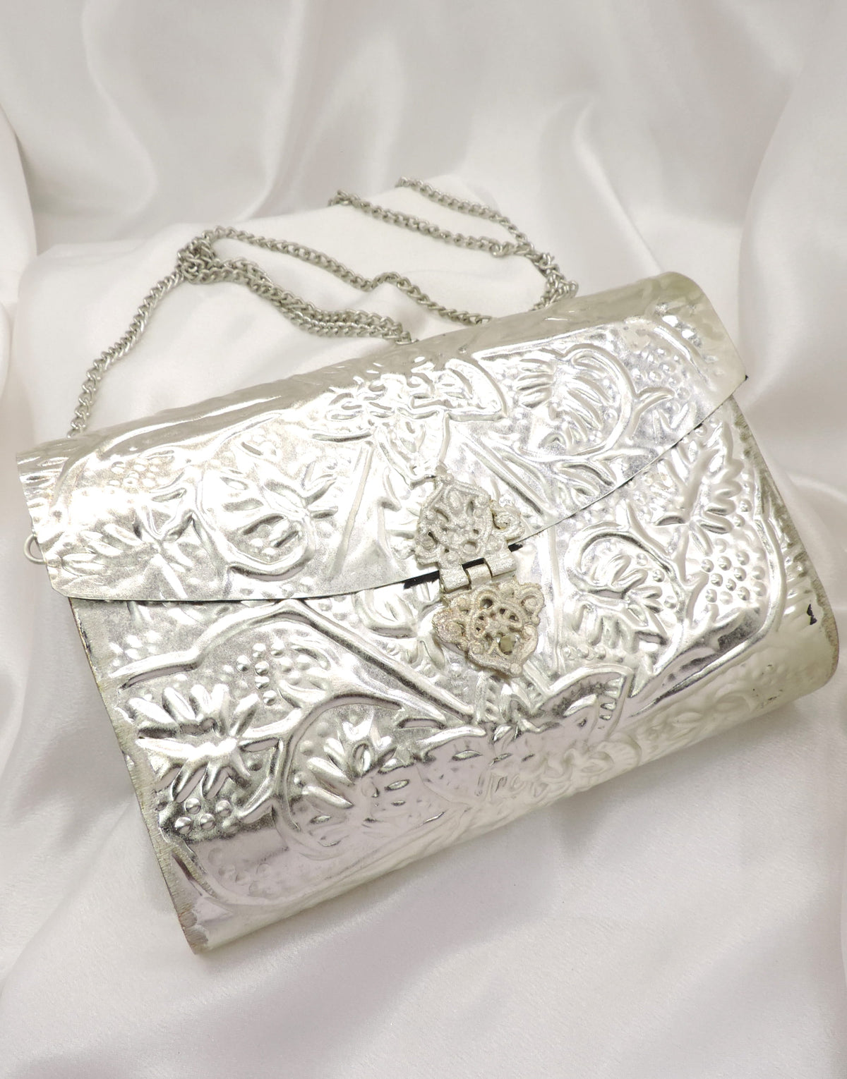 Silver Embossed Floral Clutch Bag | Joyrias