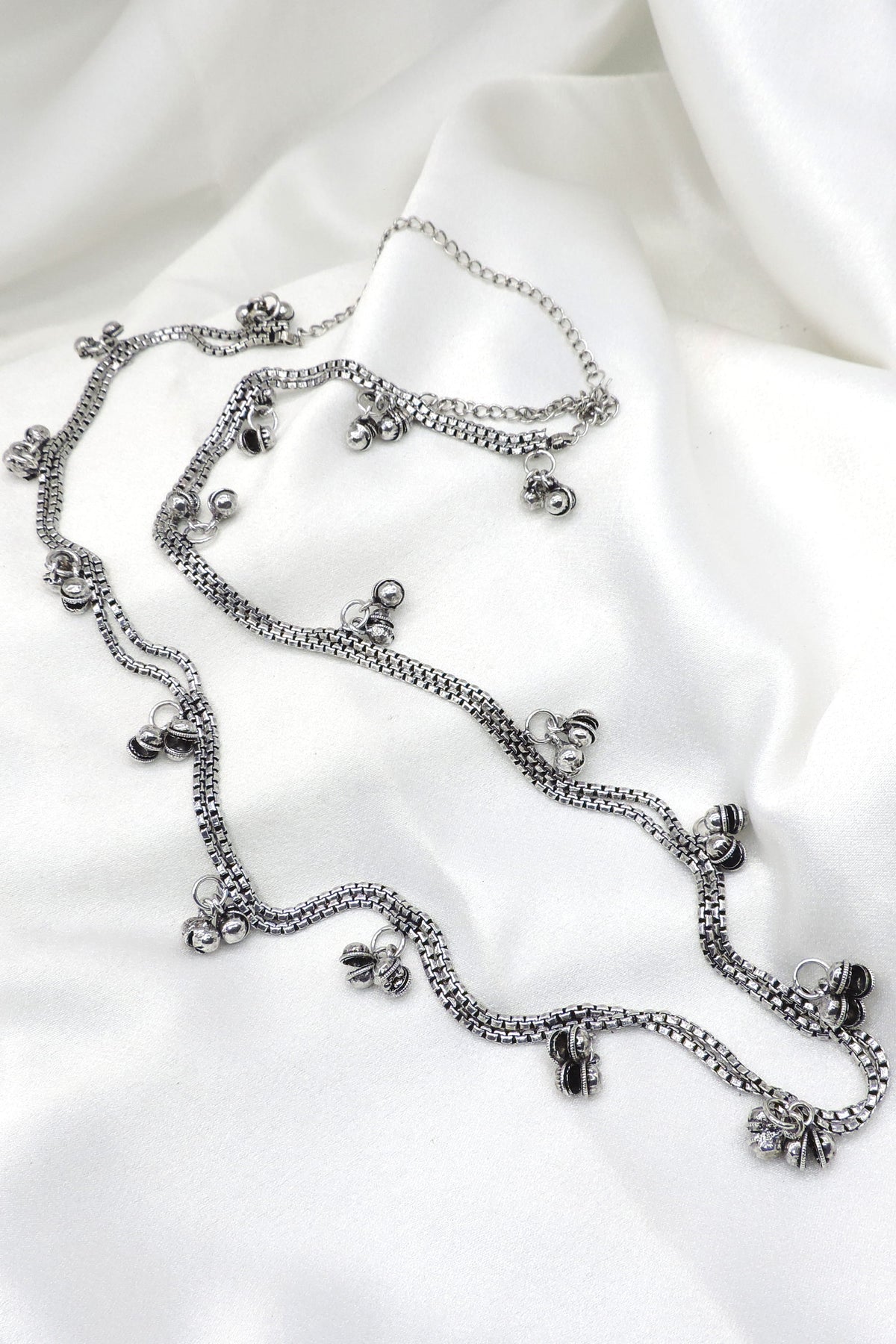 Oxidized silver dual-chain ghungroo Kamarbandh waist chain with delicate charm detailing by joyrias