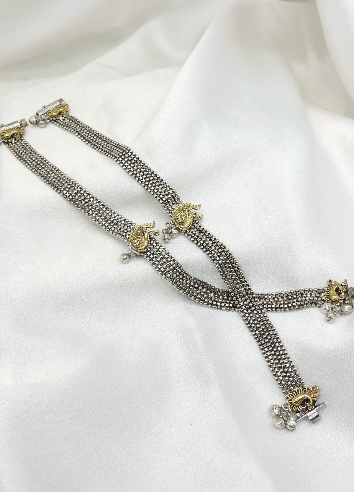 Oxidized silver dual-tone paisley anklet with detailed beadwork and charms by joyrias