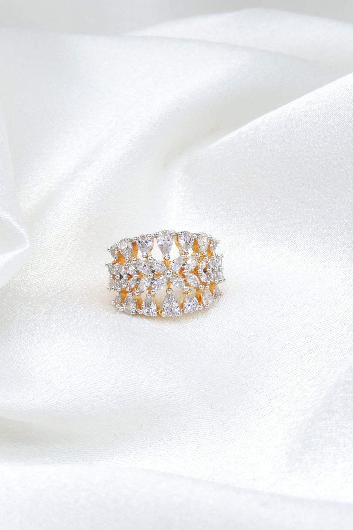 Ornate CZ mesh ring with gold-toned detailing by joyrias