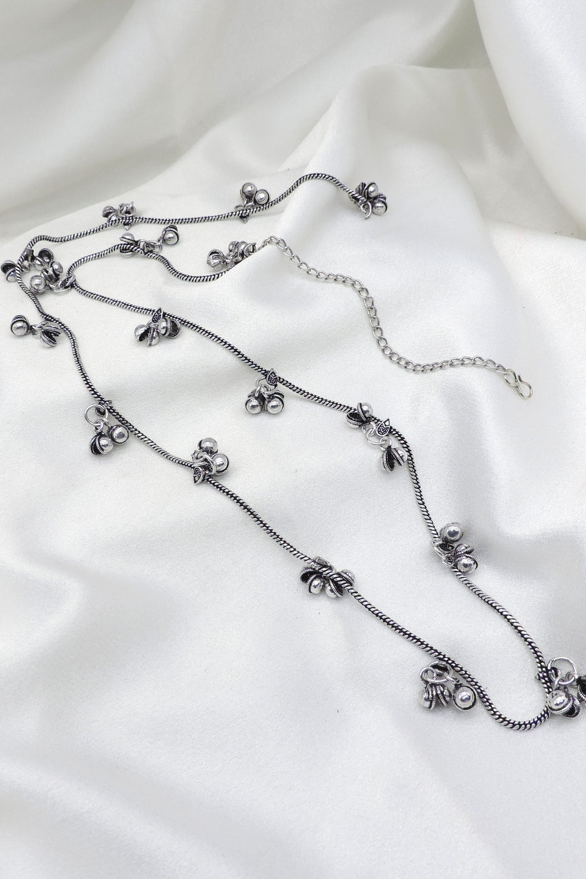 Oxidized silver minimal ghungroo Kamarbandh waist chain with delicate chain detailing and dangling bell charms by joyrias