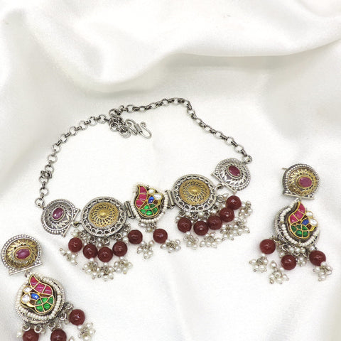 Oxidized dual-tone multicolor stone pearl choker set with matching earrings by Joyrias