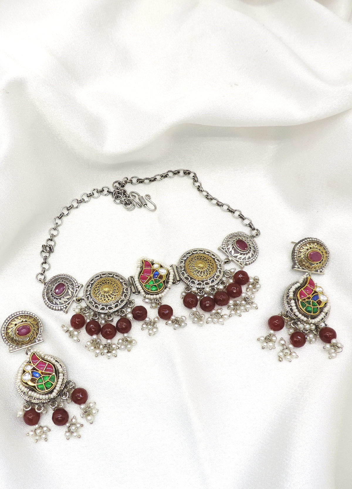 Oxidized dual-tone multicolor stone pearl choker set with matching earrings by Joyrias