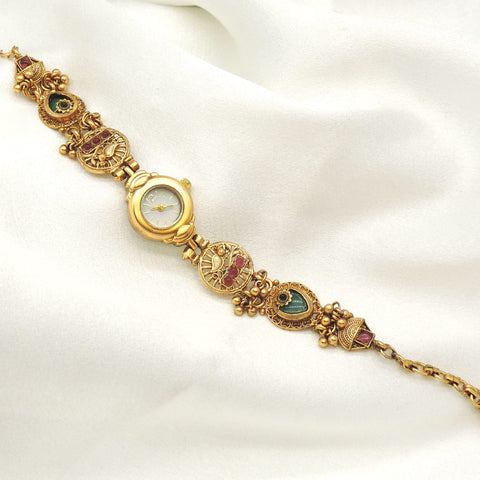 Gold-toned multicolor temple design watch with traditional detailing by joyrias