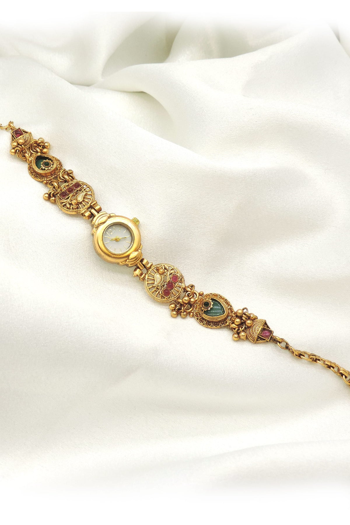 Gold-toned multicolor temple design watch with traditional detailing by joyrias