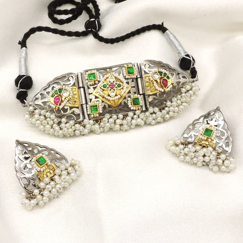 Oxidized kundan temple pearl choker set with colorful stones and matching earrings by joyrias