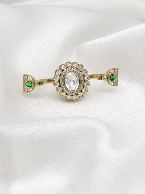 Distinctive CZ green multifinger ring with gold-toned detailing by joyrias