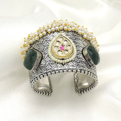 Pearl and green stone oxidized cuff bracelet by Joyrias