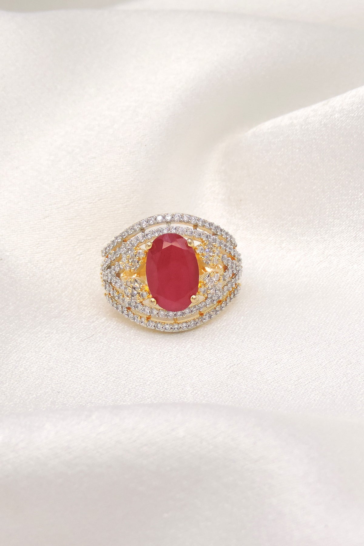 Majestic red stone CZ ring with gold-toned detailing by joyrias
