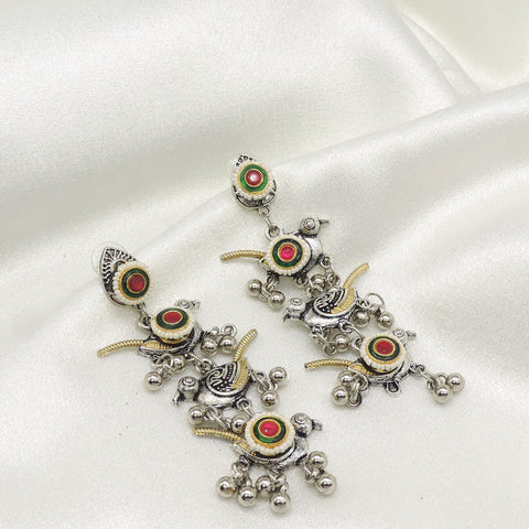 Tribal bird dangle earrings by Joyrias