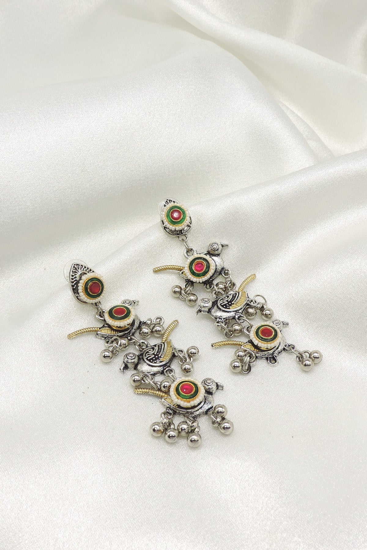 Tribal bird dangle earrings by Joyrias