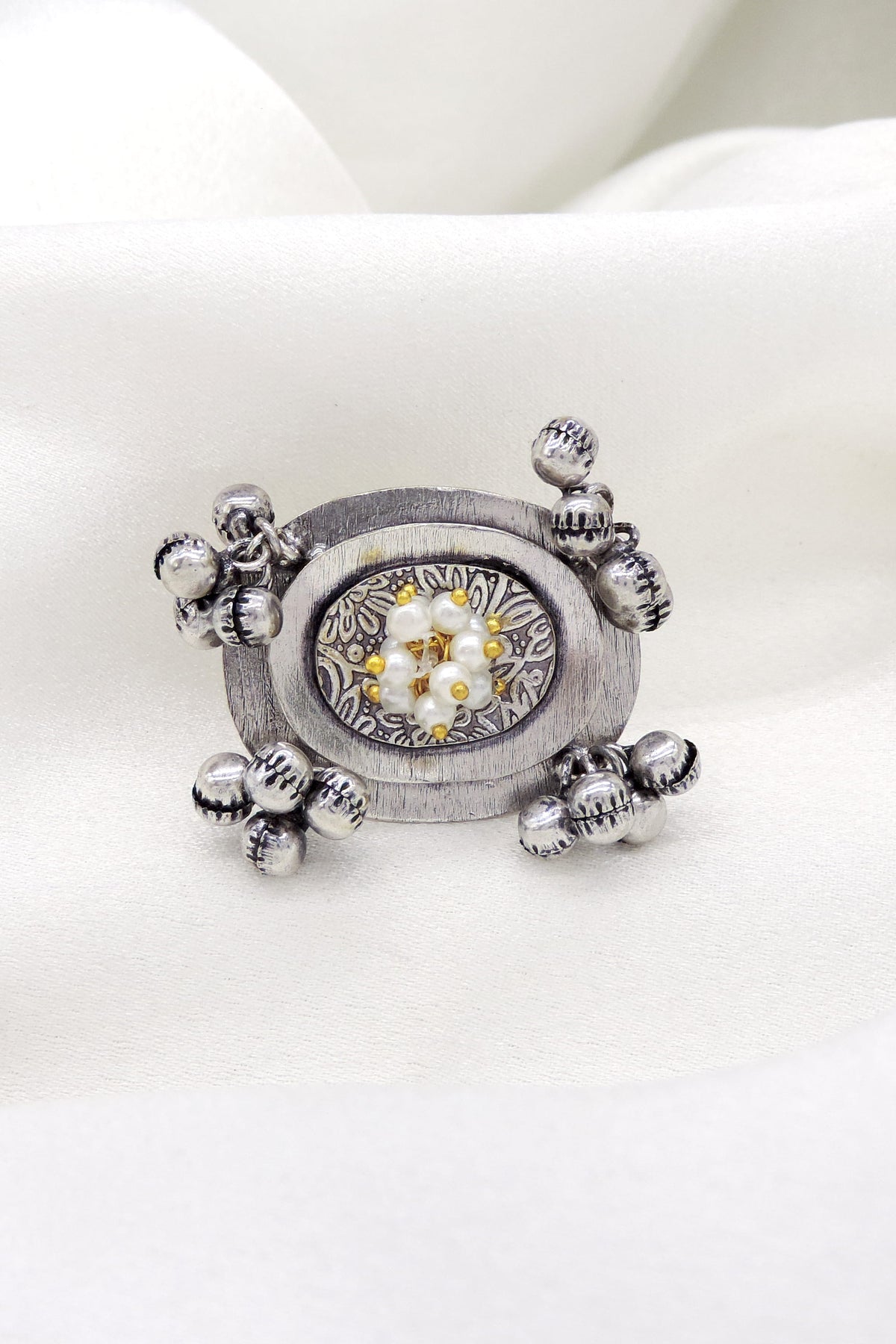Oxidized pearl floral oval ring with intricate antique silver detailing from joyrias
