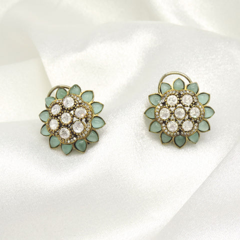 Mint floral stud earrings by Joyrias