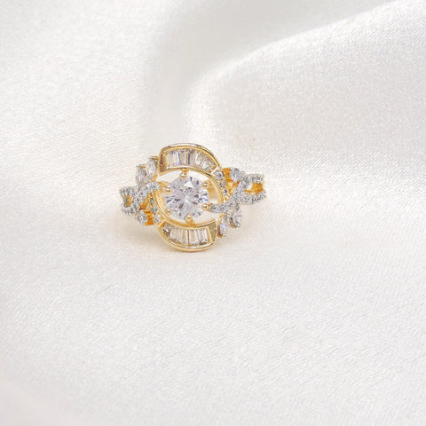 Ornate dual-tone stone ring with baguette detailing and sparkling accents by joyrias