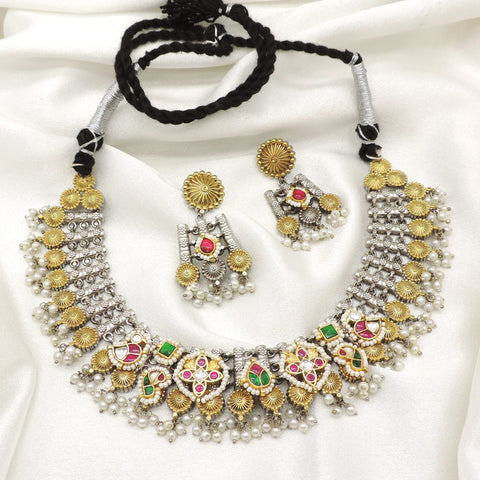 Oxidized multicolor kundan pearl necklace set with matching earrings by Joyrias