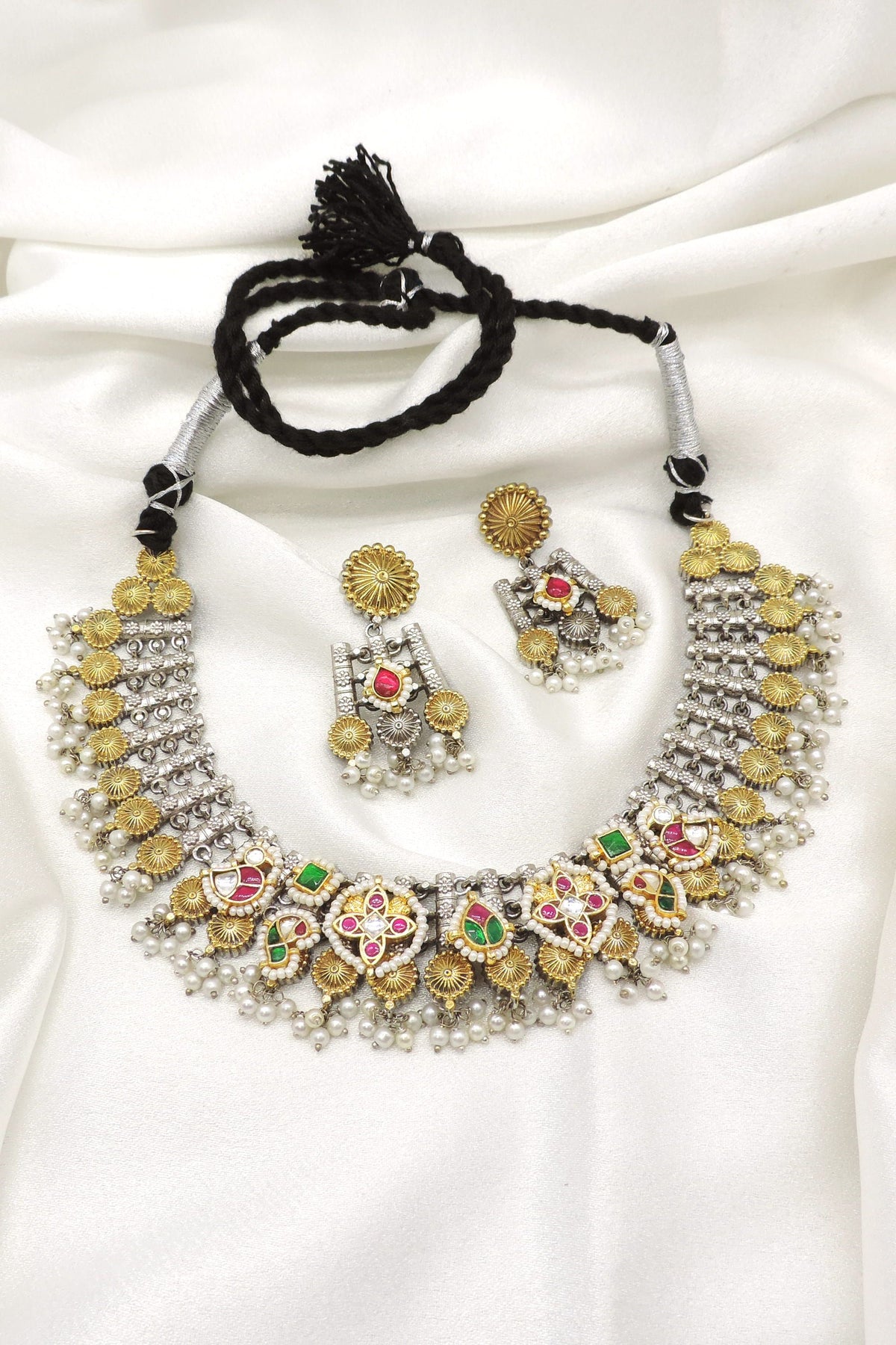 Oxidized multicolor kundan pearl necklace set with matching earrings by Joyrias