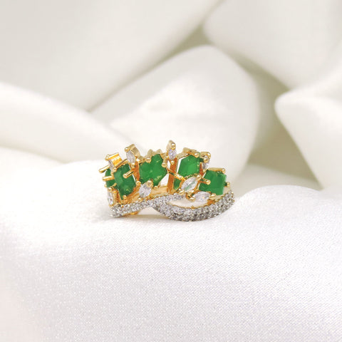 Regal green stone CZ ring with gold-toned detailing by joyrias