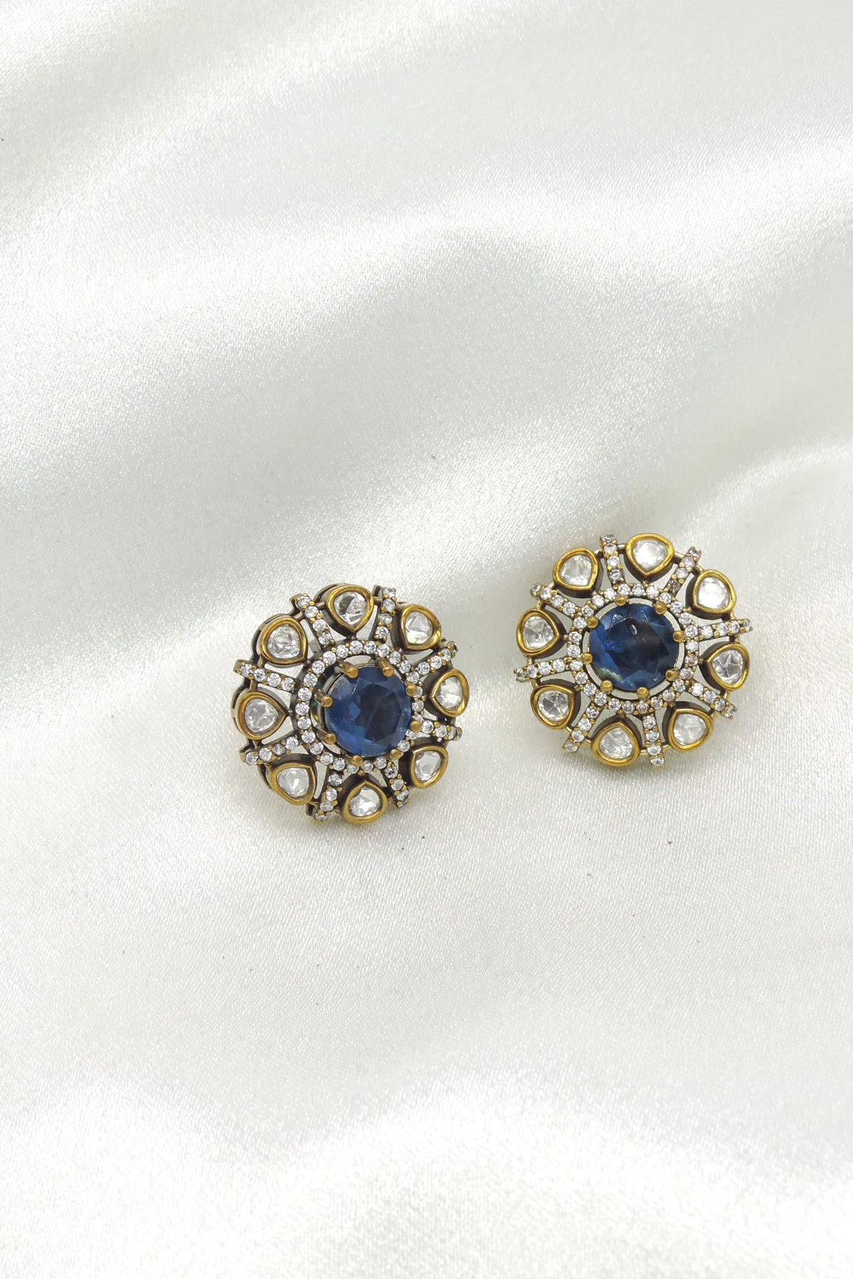 Royal blue floral stud earrings by Joyrias