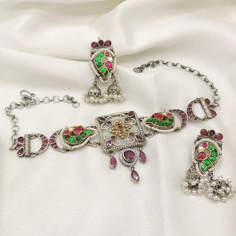 Oxidized silver Pachi Kundan choker necklace set with green and maroon stones and matching earrings by joyrias