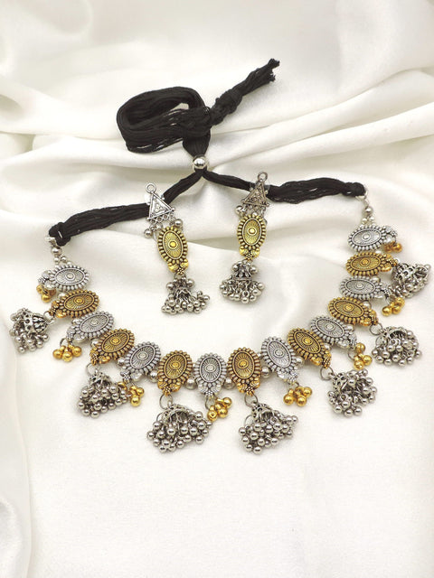 Oxidized dual-tone floral pearl choker set with matching earrings by Joyrias
