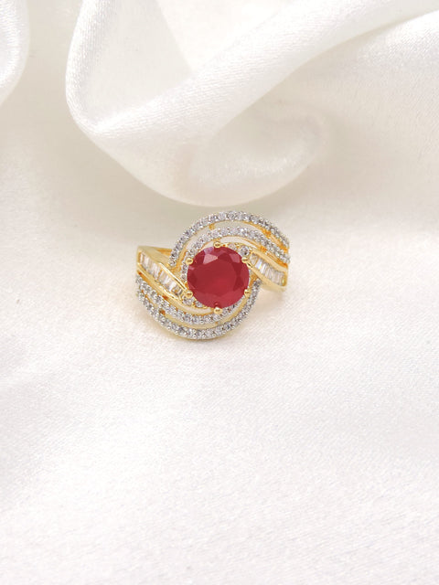 Crimson red stone CZ swirled ring with gold-toned detailing by joyrias