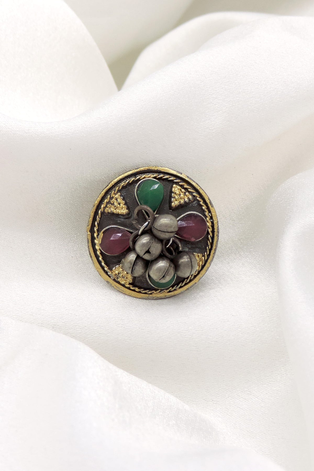 Oxidised multicolor floral ring with green and ruby-toned stones and bead detailing from joyrias
