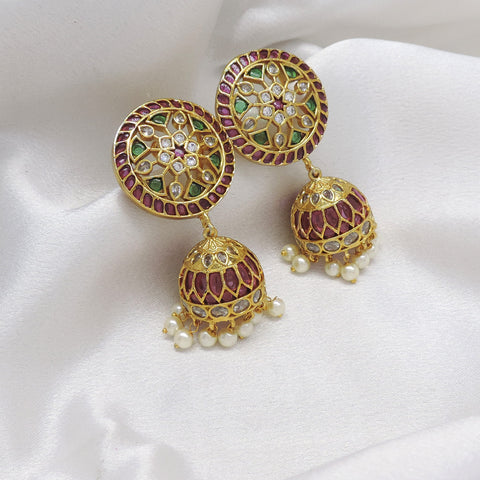 Kundan meenakari pink green pearl jhumka earrings with traditional detailing by joyrias