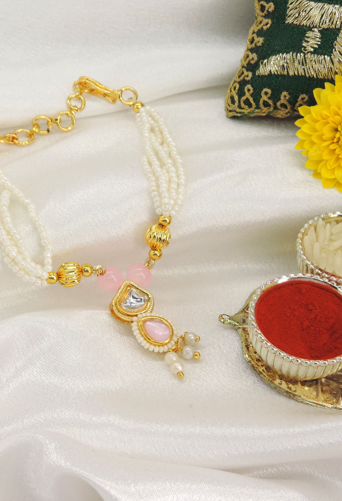 Pink Kundan Pearl Bhabhi Rakhi by Joyrias