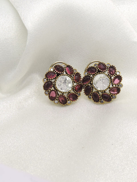 Burgundy stone floral stud earrings by Joyrias