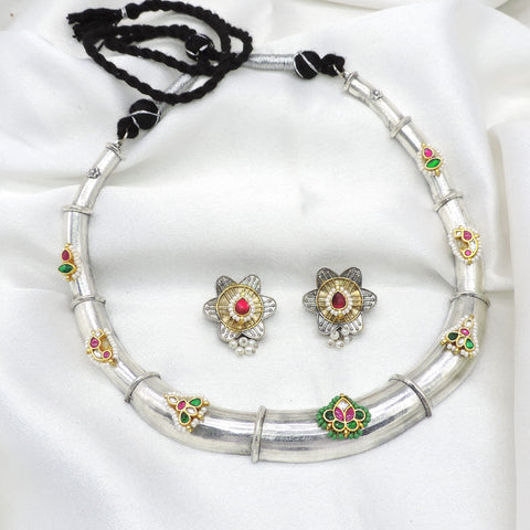 Oxidized dual-tone floral Meenakari necklace set with green pink accents and matching earrings by joyrias