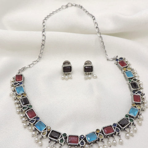 Oxidized dual-tone multicolor rectangular stone necklace set with matching earrings and pearl detailing by joyrias
