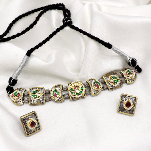 Oxidized vintage dual-tone kundan necklace set with colorful stones, pearl detailing and matching earrings by joyrias